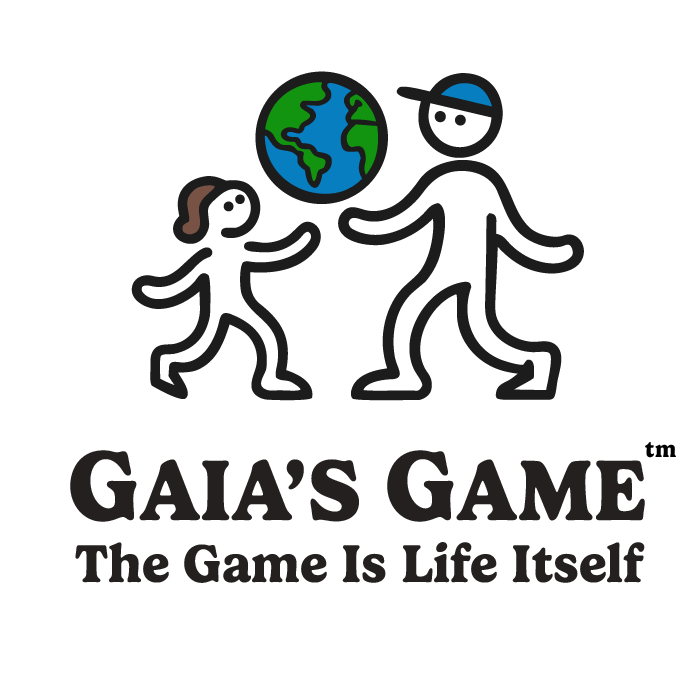 Gaias-Game-Inc_Logo showing 2 people outlines playing with an earth ball and the slogan. The Game Is Life Itself!
